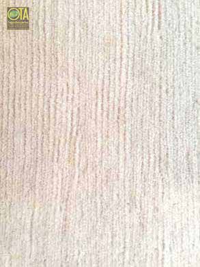 Brandlöcher wurden im Wollteppich nachgeknüpft. Er ist wie neu und hat sein Wert erhalten