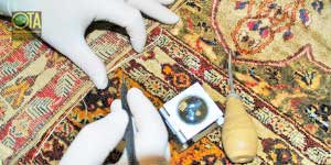 Konservierung eines antiken Teppichs